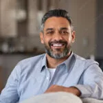 Home smiling Indian man portrait