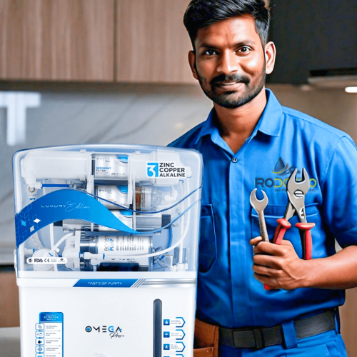 technician standing beside RO purifier holding tools for maintenance